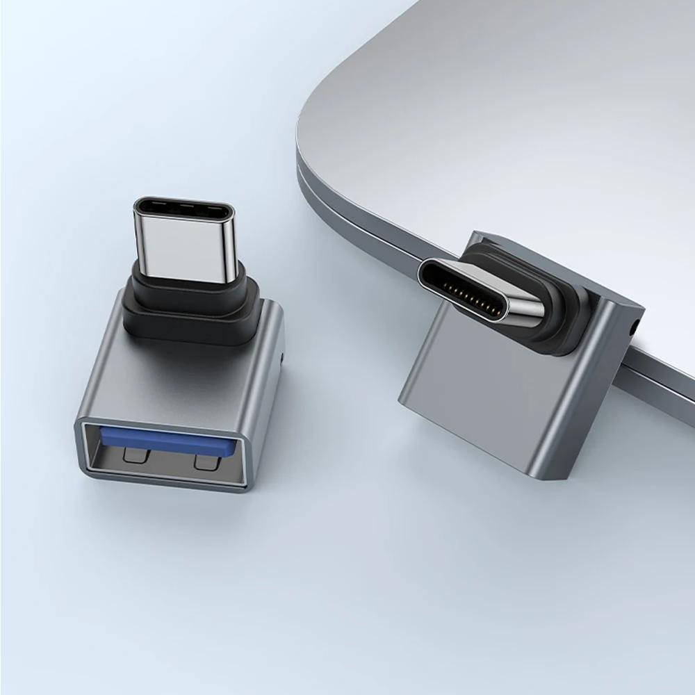 Flat lay of 5 essential gadgets modern successful women carry daily.