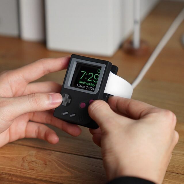 Retro Apple Watch charging stand styled like a vintage Macintosh computer on a desk in Nightstand Mode.